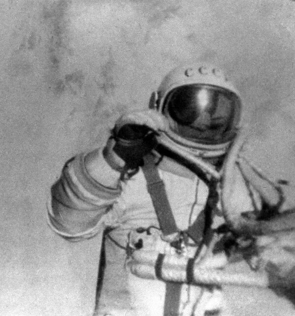 Still from the documentary “In a Spacesuit Over the Planet,” shot in space. Cosmonaut Alexey Leonov in outer space. Leonov was the first person to walk through space on March 18, 1965, when he left the Voskhod 2 mission capsule for 12 minutes 9 seconds. - Sputnik International