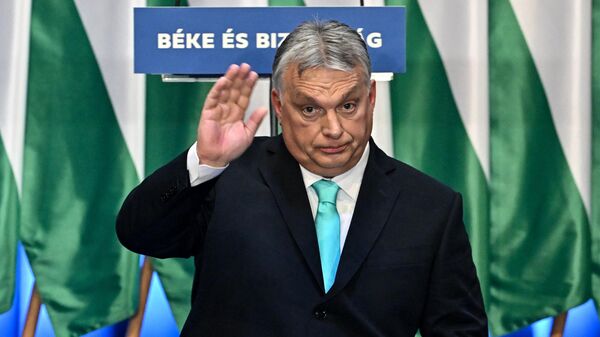 Hungarian Prime Minister and Chairman of the governing FIDESZ party Viktor Orban gestures after delivering his annual state of the nation speech, February 2023. - Sputnik International