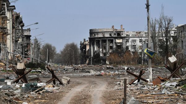 View on destroyed buildings on Liberty Square, center of Artemovsk - Sputnik International