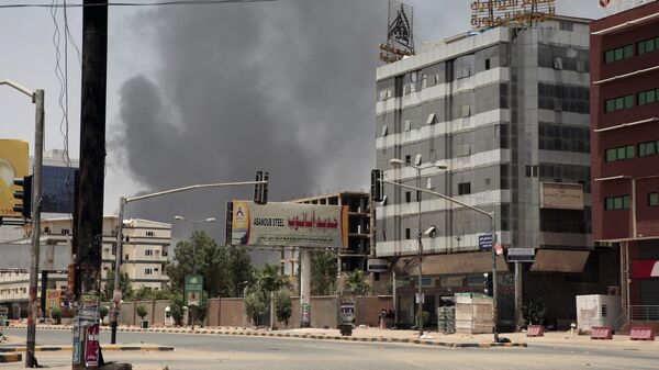 Smoke is seen rising from a neighborhood in Khartoum, Sudan, Saturday, April 15, 2023. - Sputnik International