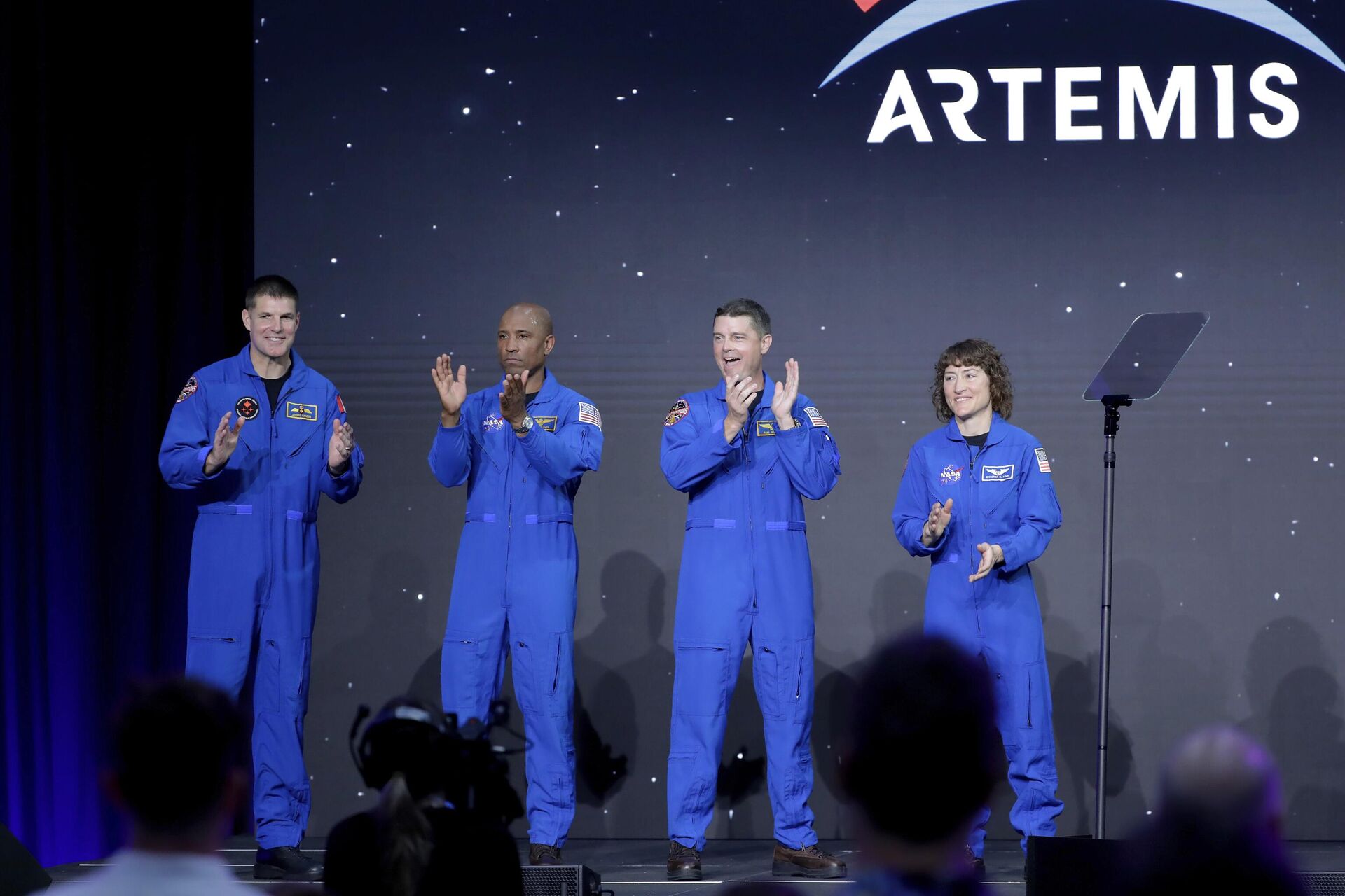 From left, Jeremy Hansen, Victor Glover, Reid Wiseman and Christina Hammock Koch, celebrate on stage as they are announced as the Artemis II crew during a NASA ceremony naming the four astronauts who will fly around the moon by the end of next year, at a ceremony held in the NASA hangar at Ellington airport Monday, April 3, 2023, in Houston. This crew will not land or even go into lunar orbit. Rather, they will fly around the moon and head straight back to Earth. The 10-day mission will be a prelude to a lunar landing a year later. - Sputnik International, 1920, 18.04.2023