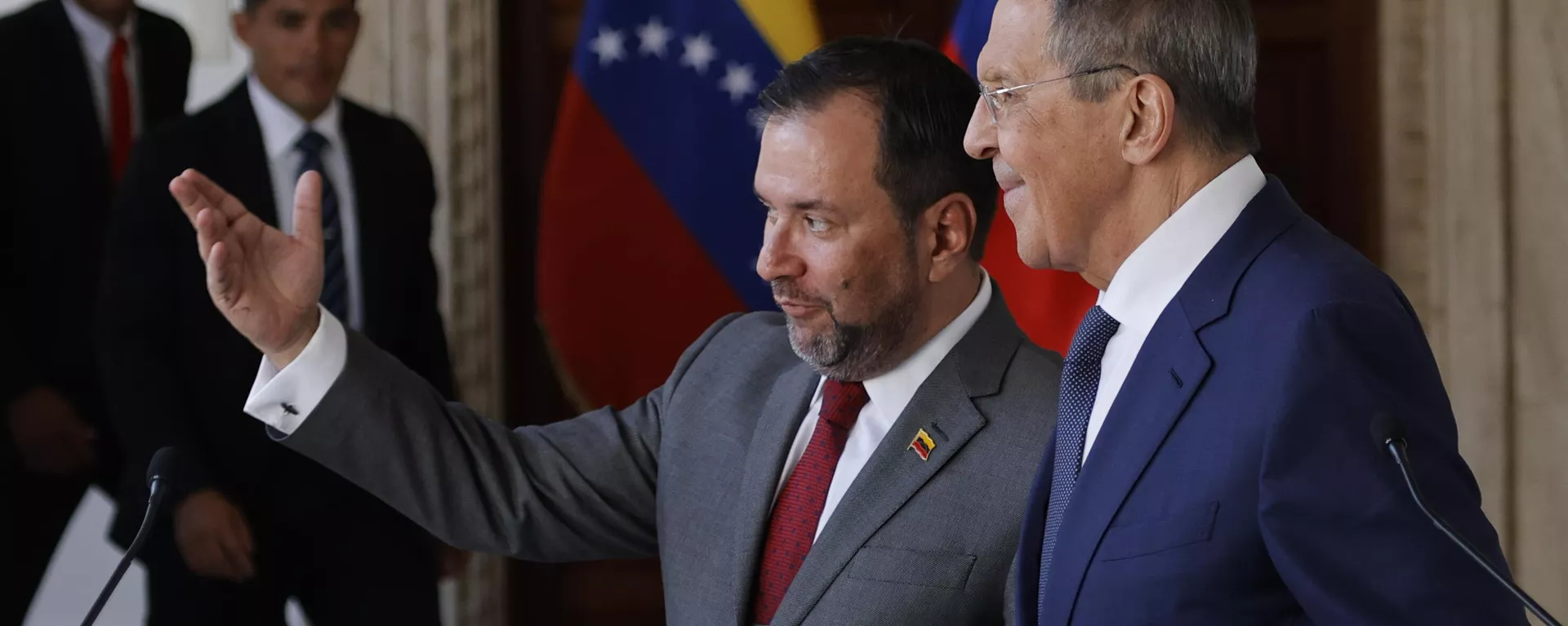 Venezuela's Foreign Minister Yvan Gil, left center, and Russia's Foreign Minister Sergei Lavrov, talk after a press conference at the Foreign Ministry in Caracas, Venezuela, Tuesday, April 18, 2023.  - Sputnik International, 1920, 19.04.2023