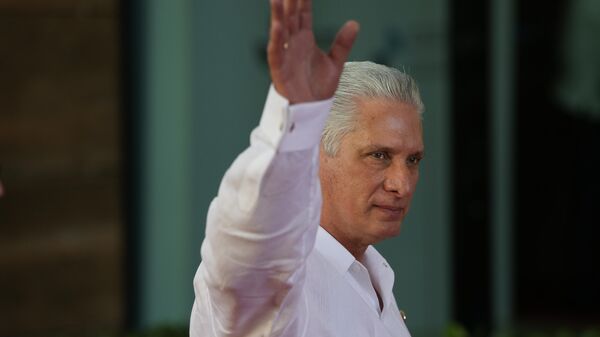 Cuba's President Miguel Diaz-Canel waves as he arrives for a session during the 28th Ibero-American Summit in Santo Domingo, Dominican Republic, March 25, 2023. - Sputnik International