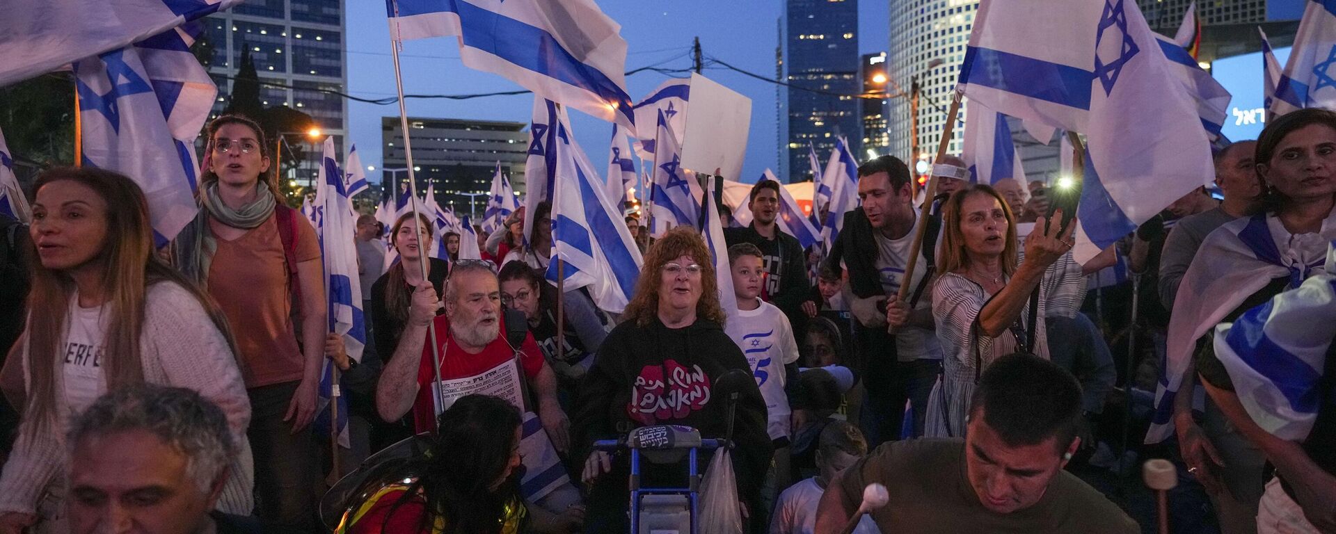 Israelis protest against plans by Prime Minister Benjamin Netanyahu's government to overhaul the judicial system in Tel Aviv, Israel, Saturday, April 22, 2023. - Sputnik International, 1920, 15.07.2023