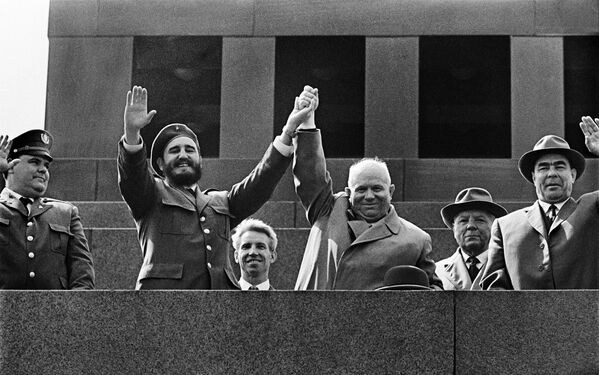 On May 1, the Cuban leader took part in celebrations sitting on the podium of the Lenin Mausoleum on Red Square and watching the military parade.Above: Cuban leader Fidel Castro and First Secretary of the Communist Party of the Soviet Union Nikita Khrushchev on the podium of the Lenin Mausoleum in Moscow. - Sputnik International