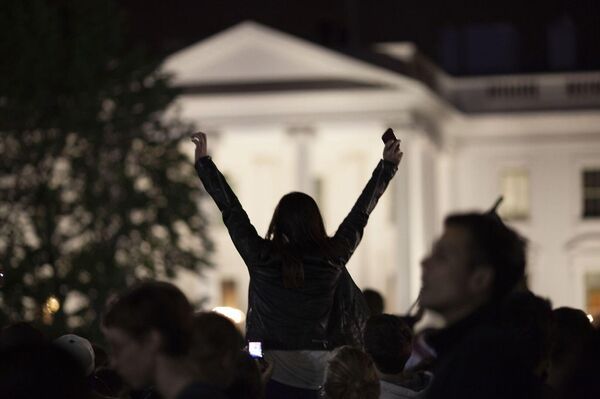 The crowd celebrates after President Obama's address - Sputnik International