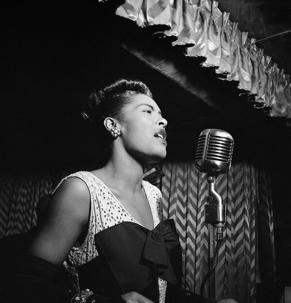 Billie Holiday at the Downbeat club, a jazz club in New York City, 1947.Billie Holiday aka &quot;Lady Day&quot; is known for strong lyrics, for example the “Strange Fruit” song slams the practice of lynching Black Americans which that time was wide-spread in Southern states. Lady Day allegedly even had issues with American authorities due to this song. - Sputnik International