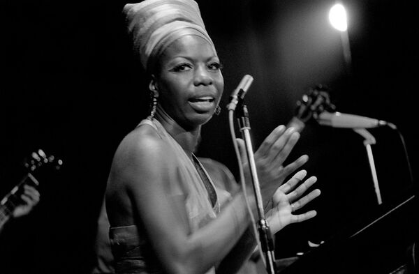 American jazz singer Nina Simone performs in July 1969 at the Pan-African festival in Algiers, Algeria. Simone was not only a musician, but also a civil rights activist. She gave her first big concert when she was 12. Later she will recall that her parents were moved from the front row to the back of the hall due to their skin color. She claims that she refused to start playing until they were moved back to the front.  - Sputnik International