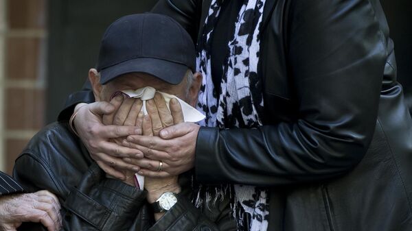 Men mourns his relative killed in Odessa Massacre - Sputnik International