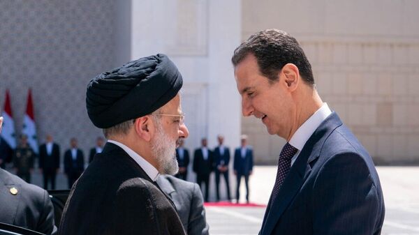 Bashar al-Assad and Ebrahim Raisi - Sputnik International
