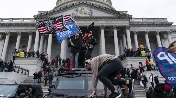 Supporters of US President Donald Trump protest outside the US Capitol on January 6, 2021, in Washington, DC.  - Sputnik International