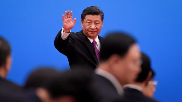 China's President Xi Jinping waves as he leaves after a press conference at the end of the final day of the Belt and Road Forum at the China National Convention Centere at the Yanqi Lake venue outside Beijing on April 27, 2019 - Sputnik International