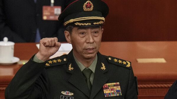 Newly-elected Chinese Defense Minister Gen. Li Shangfu takes his oath during a session of China's National People's Congress (NPC) at the Great Hall of the People in Beijing on March 12, 2023. - Sputnik International
