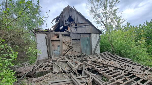 Residential building in Gorlovka damaged after Ukrainian forces shelling - Sputnik International