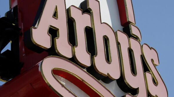 This March 1, 2010, file photo shows an Arby's restaurant sign in Cutler Bay, Fla. Arby's is buying casual dining chain Buffalo Wild Wings in a deal worth about $2.4 billion. Arby's Restaurant Group Inc. said Tuesday, Nov. 28, 2017, that it will pay $157 per share. - Sputnik International