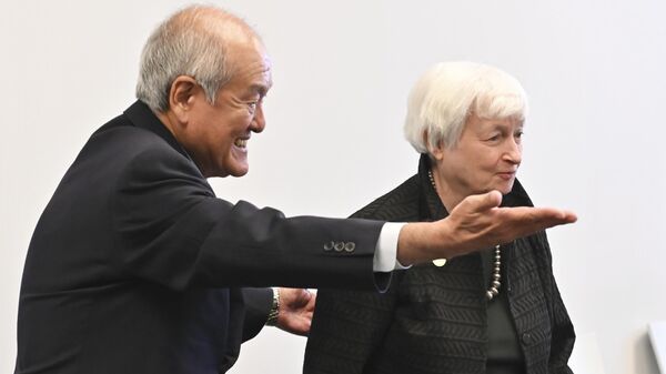 Japan's Finance Minister Shunichi Suzuki , left, escorts U.S. Treasury Secretary Janet Yellen prior to their meeting during the G-7 Finance Ministers and Central Bank Governors' Meeting at the Toki Messe convention center in Niigata, Japan. - Sputnik International