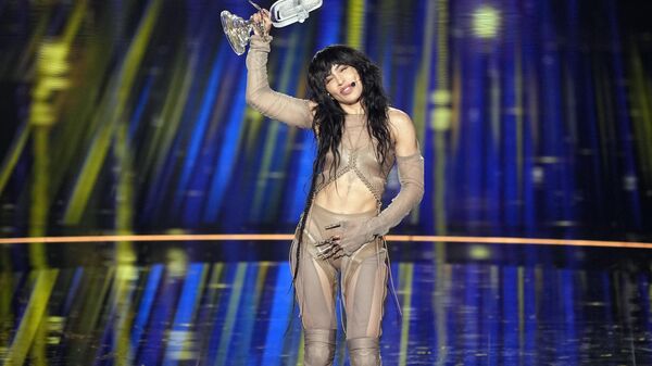 Loreen of Sweden celebrates with the trophy after winning the Grand Final of the Eurovision Song Contest in Liverpool, England, Saturday, May 13, 2023.  - Sputnik International