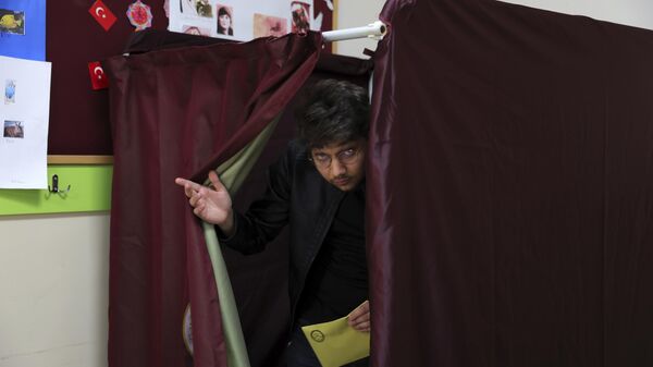 A man votes at a polling station in Ankara, Turkiye, Sunday, May 14, 2023. - Sputnik International