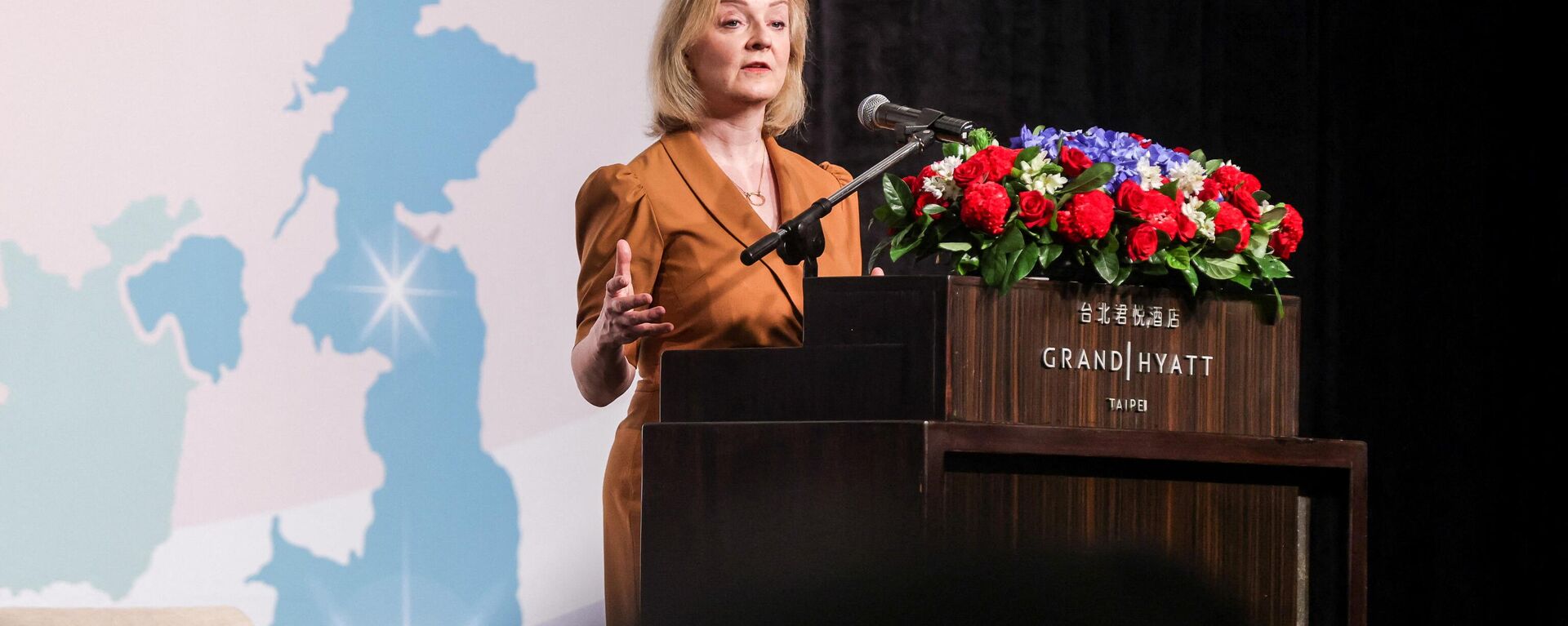Britain's former prime minister Liz Truss delivers a speech as part of her five-day visit to Taiwan, in Taipei on May 17, 2023 - Sputnik International, 1920, 17.05.2023