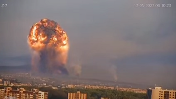 A frame of a CCTV video, purportedly depicting a major blast at an ammo depot in Khmelnintsky, Ukraine. - Sputnik International