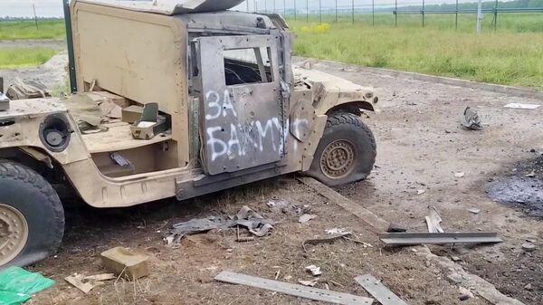 Wrecked military vehicle used by Ukrainian militants during their attack on Russia's Belgorod Region - Sputnik International