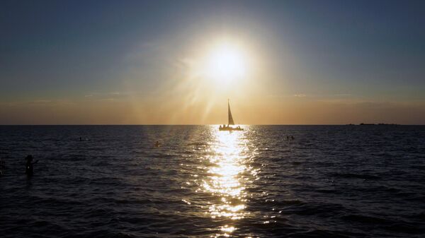 A sailboat on the Azov Sea near the resort city of Yeysk. - Sputnik International