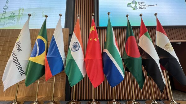 Flags are seen displayed at the opening ceremony of the New Development Bank Eighth Annual Meeting in Shanghai on May 30, 2023 - Sputnik International