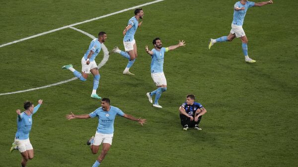 Manchster City players celebrate their 1-0 win at the end of the Champions League final soccer match between Manchester City and Inter Milan at the Ataturk Olympic Stadium in Istanbul, Turkey, Saturday, June 10, 2023.  - Sputnik International
