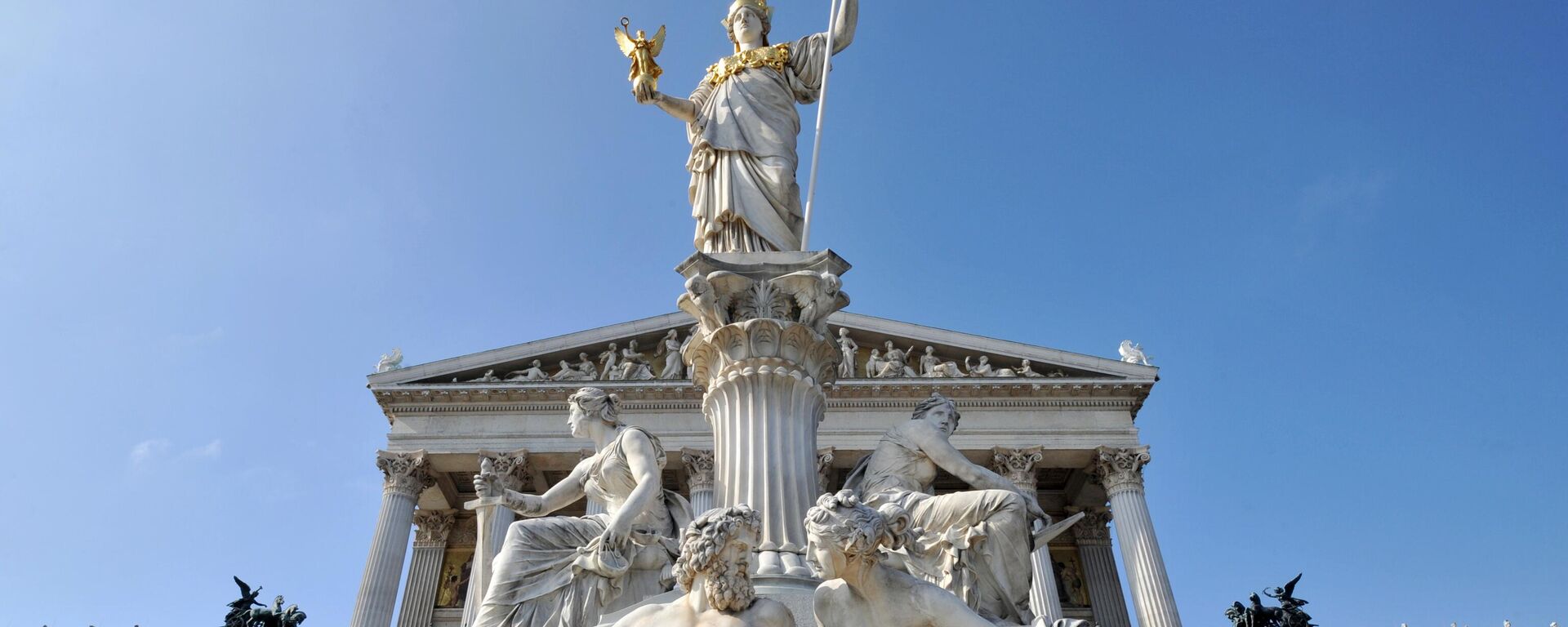 The sculptural composition of the Pallas Athena fountain, created by sculptors Carl Kundmann, Josef Tautenhayn and Hugo Haerdtl in front of the Austrian Parliament in Vienna. - Sputnik International, 1920, 11.06.2023