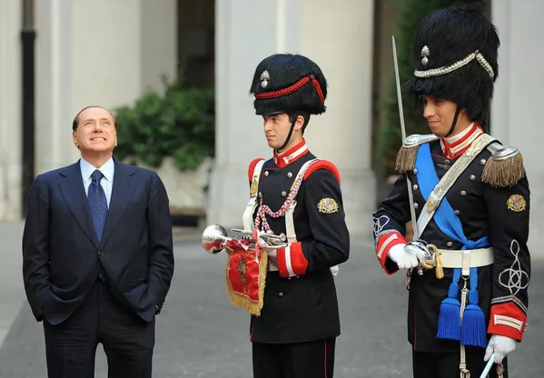 Berlusconi&#x27;s endeavors in the real estate sector allowed him to amass considerable wealth by the 1970s.Above: Silvio Berlusconi waits for Palestinian president Mahmud Abbas. - Sputnik International