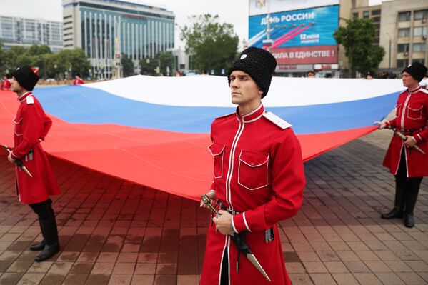 On June 12, 1990, Russia adopted a declaration on its national sovereignty.Above: Kuban Cossack Host honor guard seen during the Russia Day celebration at the Main City Square of Krasnodar. - Sputnik International