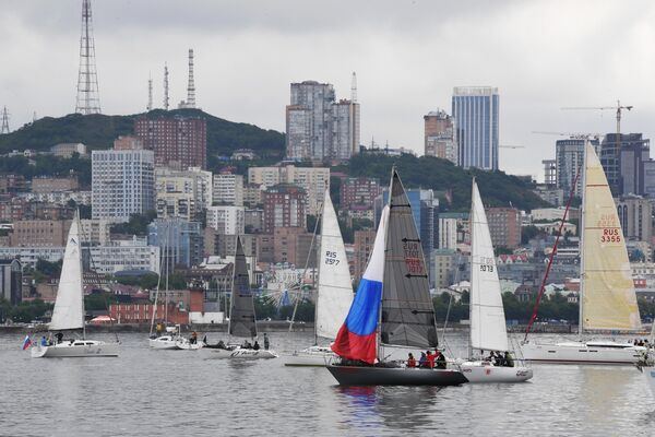 Boats participating in the &quot;Sails of Russia&quot; regatta, held to celebrate Russia Day, in Vladivostok. - Sputnik International