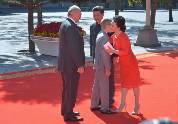 Belarusian President Alexander Lukashenko and his son Nikolay and Chinese President Xi Jinping and his wife Peng Liyuan in Beijing - Sputnik International