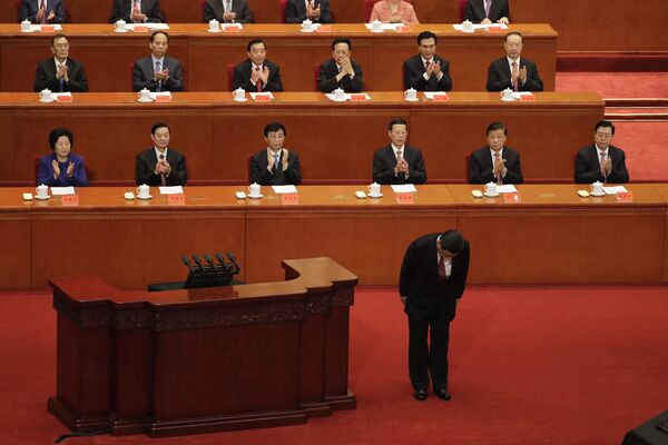 China's President Xi Jinping bows before delivering a speech at a ceremony to commemorate the 90th anniversary of the founding of the People's Liberation Army, at the Great Hall of the People in Beijing. - Sputnik International