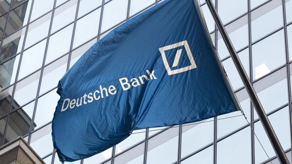 In this Oct. 7, 2016, file photo a flag for Deutsche Bank flies outside the German bank's New York offices on Wall Street. - Sputnik International