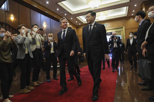 Originally expected to take place earlier this year, Blinken&#x27;s visit to Beijing got postponed after a wayward Chinese weather balloon accidentally strayed into US airspace, which prompted the US government to accuse China of trying to spy on American military installations.Above: US Secretary of State Antony Blinken, center, left, walks with Chinese Foreign Minister Qin Gang, center right, at the Diaoyutai State Guesthouse. - Sputnik International