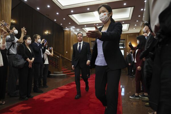 Even though the United States repeatedly escalated tensions around Taiwan, Blinken claimed that the US does not seek to engage in a conflict with China.Above: US Secretary of State Antony Blinken, center, walks as he arrives to meet with China&#x27;s top diplomat Wang Yi, not in photo, at the Diaoyutai State Guesthouse in Beijing. - Sputnik International
