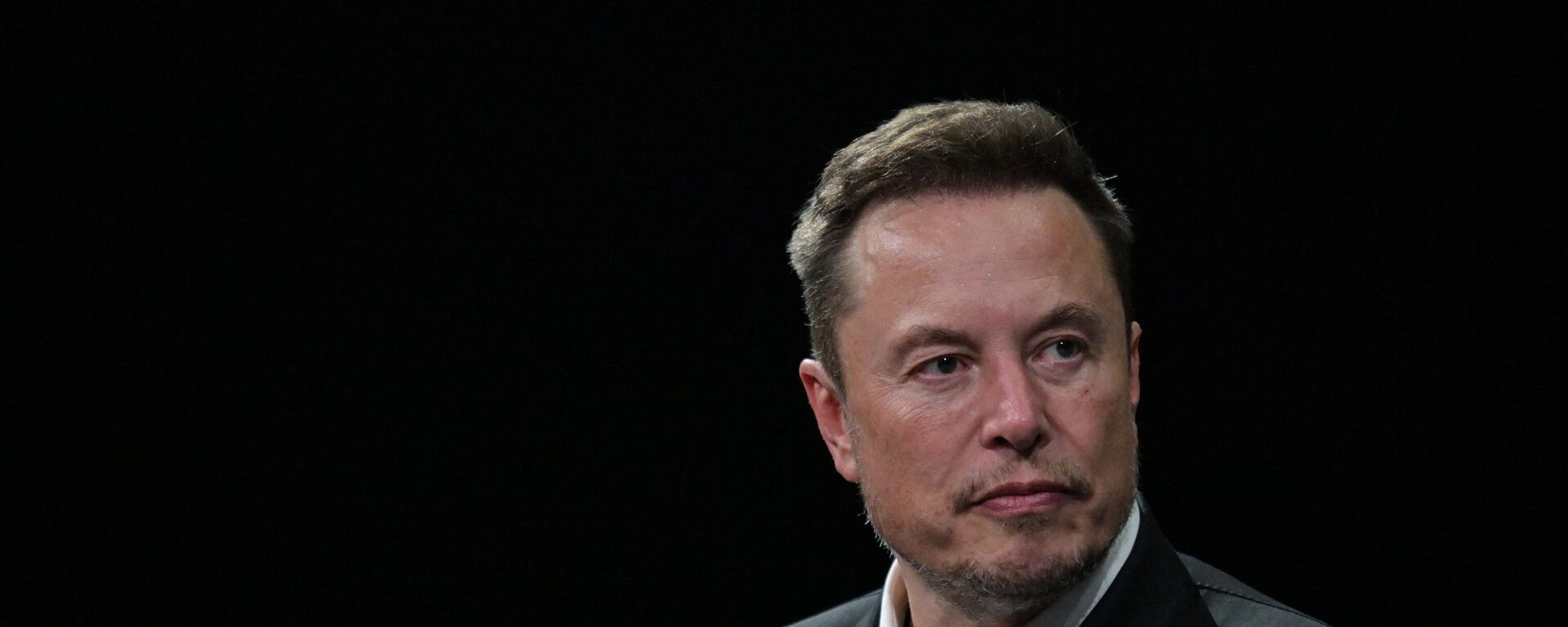 SpaceX, Twitter and electric car maker Tesla CEO Elon Musk looks on as he speaks during his visit at the Vivatech technology startups and innovation fair at the Porte de Versailles exhibition center in Paris, on June 16, 2023 - Sputnik International, 1920, 18.07.2023