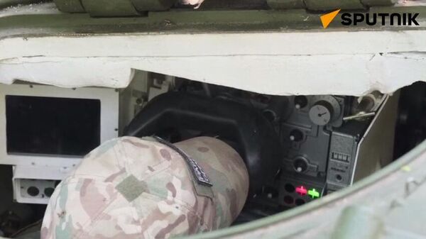 Russian tank crews destroyed a stronghold of Ukrainian troops near Krasny Liman - Sputnik International