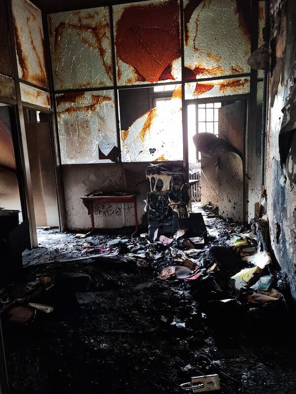 This photograph shows a burnt and destroyed room inside the L&#x27;Ile-Saint-Denis city hall, north of Paris. - Sputnik International