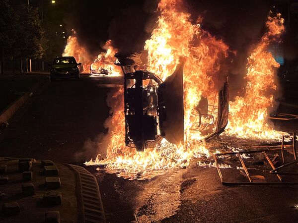 Burning cars during riots in Nanterre, France. - Sputnik International