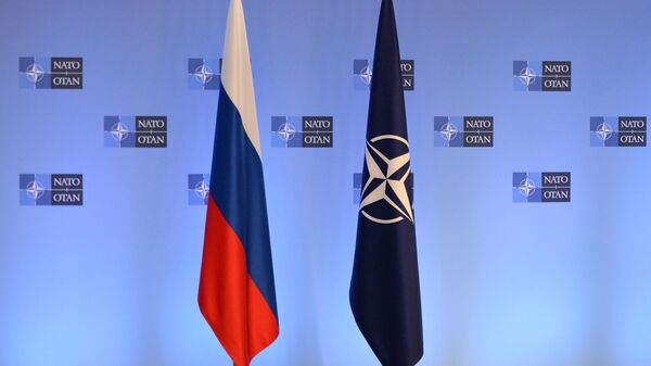 Russian and NATO flags. File photo - Sputnik International