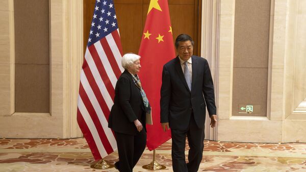 Treasury Secretary Janet Yellen, left, and Chinese Vice Premier He Lifeng walk during a meeting at the Diaoyutai State Guesthouse in Beijing, China - Sputnik International