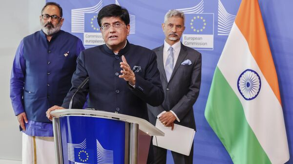 India's Commerce and Industry Minister Piyush Goyal, center, India's Minister for External Affairs S. Jaishankar, right, and India's Minister for State and Skill Development Rajeev Chandrasekhar, left, address the media during a press conference on the EU-India Trade and Technology Council at EU headquarters in Brussels, Belgium, Tuesday, May 16, 2023.  - Sputnik International