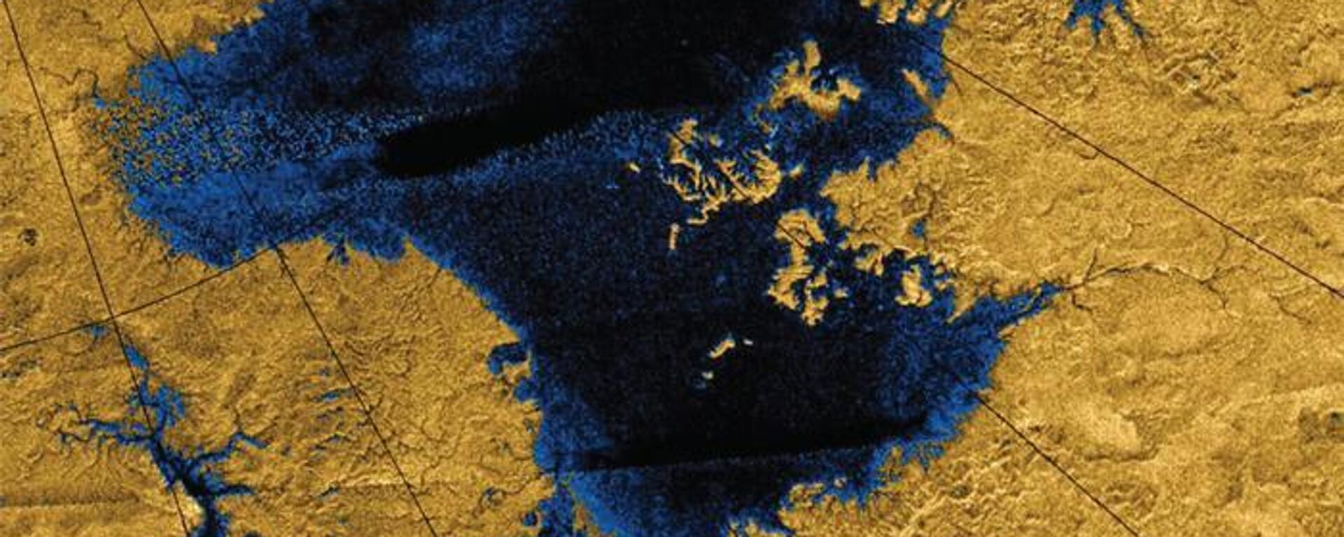 Images from the Cassini mission show river networks draining into lakes in Titan's north polar region. - Sputnik International, 1920, 11.07.2023