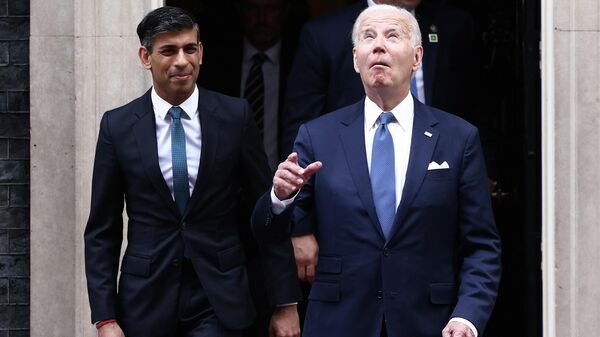 US President Joe Biden reacts as he exits 10 Downing Street with Britain's Prime Minister Rishi Sunak, following their meeting in central London on July 10, 2023. - Sputnik International