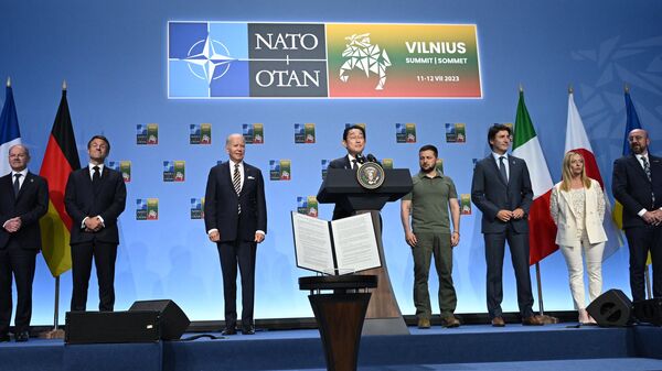 Japan's Prime Minister Fumio Kishida delivers a speech during an event with G7 leaders to announce a Joint Declaration of Support for Ukraine during the NATO Summit in Vilnius on July 12, 2023.  - Sputnik International