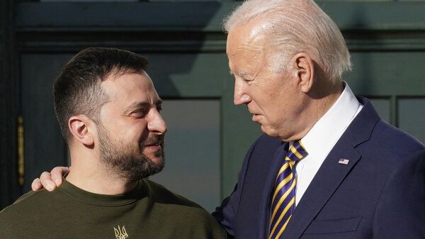 US President Joe Biden and his Ukrainian counterpart Volodymyr Zelensky. - Sputnik International