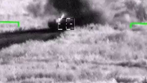 Video footage from Russia's defense ministry shows an attack on a Ukrainian armored vehicle in the Donbass. - Sputnik International