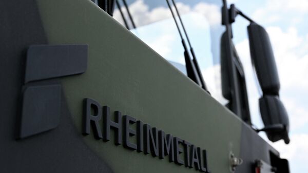 The logo of German arms manufacturer Rheinmetall - Sputnik International